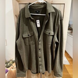 Never worn, missing top button